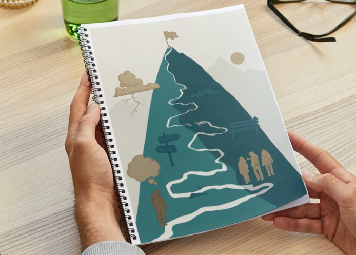 Workbook with a mountain illustration on the cover